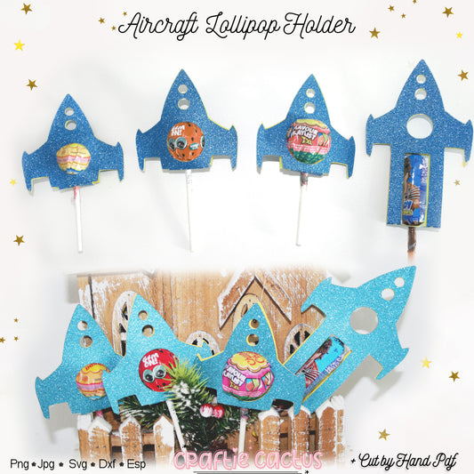 Aircraft-shaped lollipop holders with colorful designs on a white background